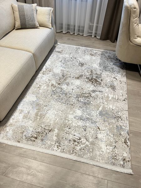Прямокутний бежевий килим з абстрактним дизайном 232246 фото